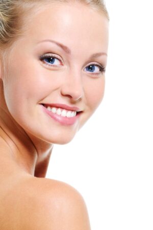 woman-face-with-nice-smile-healthy-beautiful-clear-skin-white-backgrouns_186202-4097